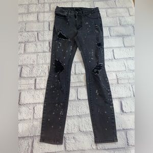 Black ripped skinny jeans with grey dots